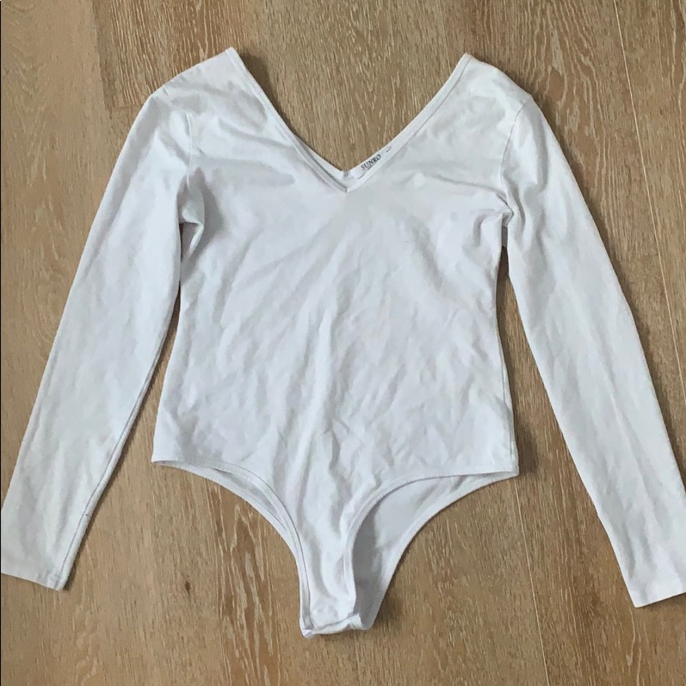 Stretchy and soft white bodysuit